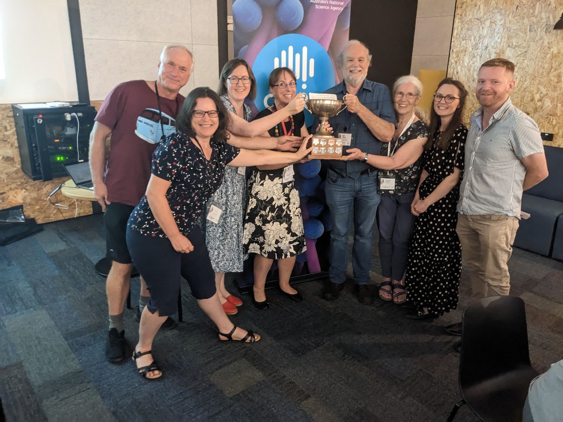 The 2023 Wagga-Trivia night winners holding up the trophy