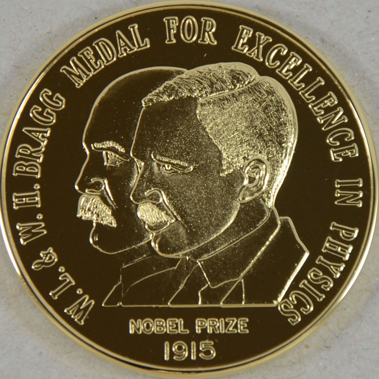 The Bragg Gold Medal, which depicts in profile Sir Laurence Bragg and his father Sir William Bragg
